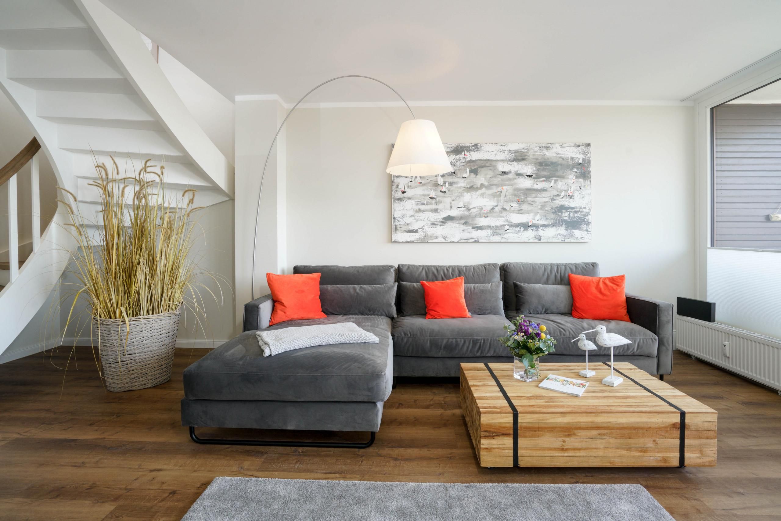 Wohnzimmer mit Sofa in Ferienwohnung auf Sylt